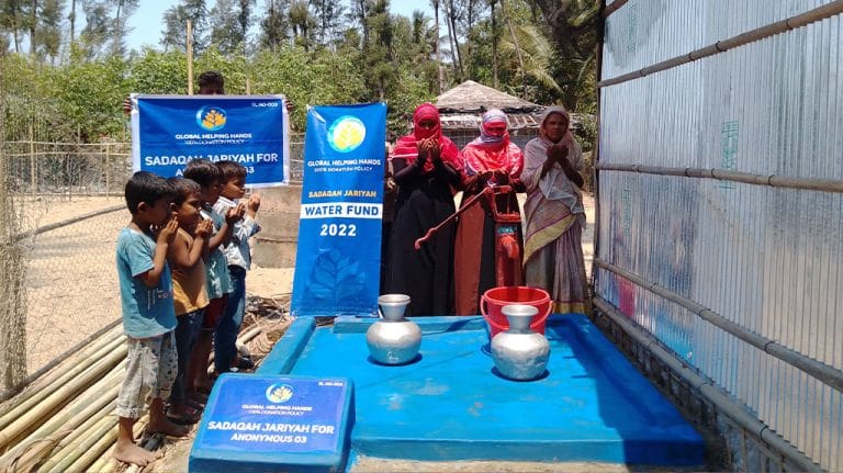 Roh water pump installation providing clean water to village