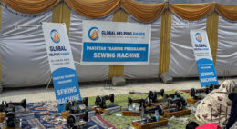 Beneficiaries receiving sewing machines for sustainable livelihood development
