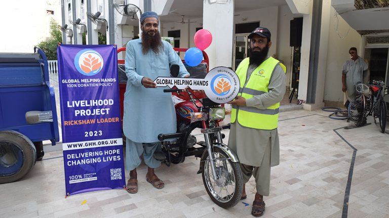 Livelihood project: a rickshaw loader motorcycle handed over to a beneficiary