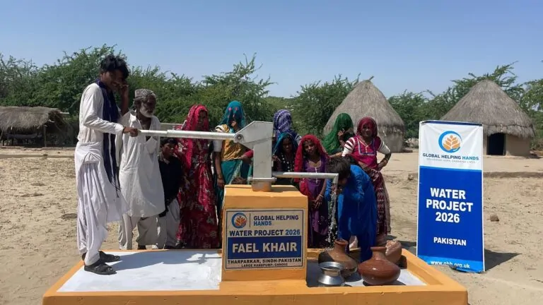 Villagers at a new Global Helping Hands hand pump in Tharparkar, Pakistan