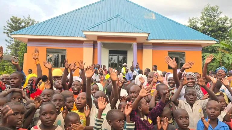 Crowd celebrating the opening of a Global Helping Hands community masjid in Uganda