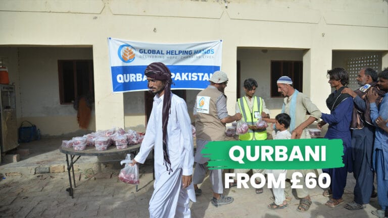 Qurbani livestock or meat distribution taking place in Pakistan community