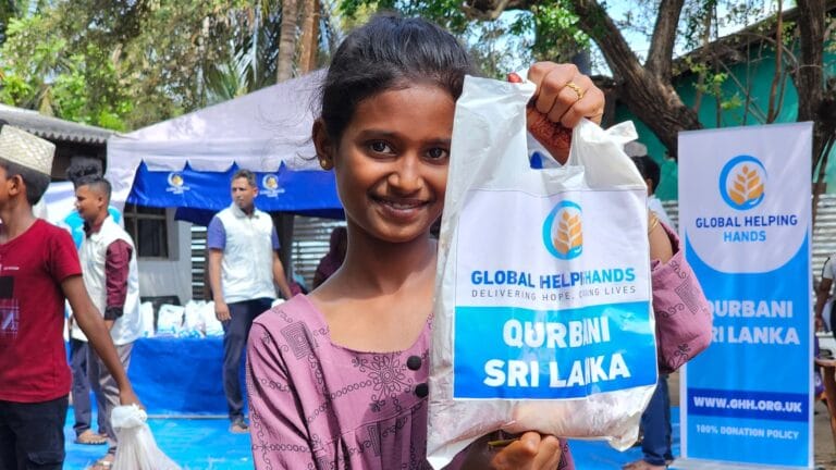 Girl holding a Qurbani Sri Lanka meat bag