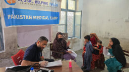 Community aid distribution or relief work captured on October 12, 2025