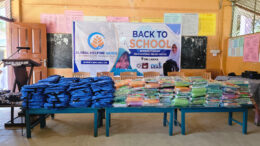 Sri Lankan students receiving educational supplies during back to school program
