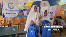 Sri Lankan students receiving school supplies and educational materials for new term