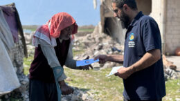 Fifteenth image in a numbered sequence showing humanitarian aid or relief work