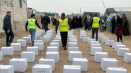 Twenty-sixth image in a numbered sequence showing humanitarian aid or relief work