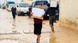 Twenty-seventh image in a numbered sequence showing humanitarian aid or relief work