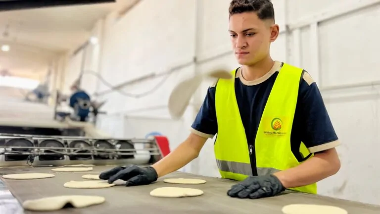 Fresh bread handed out to families in Palestine