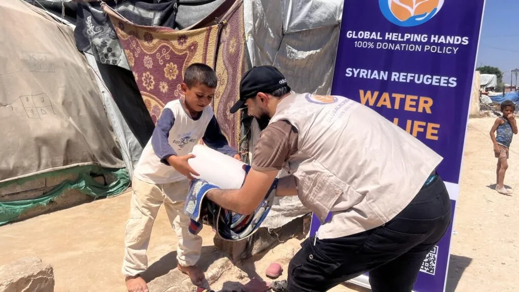Syrian Refugees Water Tanker photo, 1 of 2