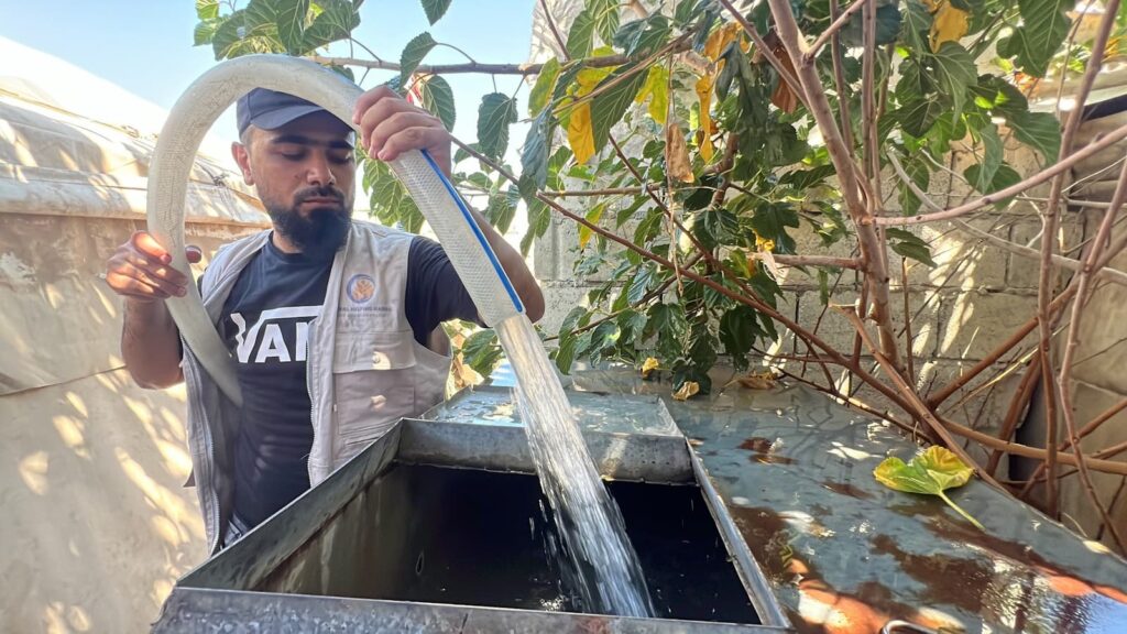Syrian Refugees Water Tanker photo, 2 of 2